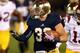 SOUTH BEND, IN - OCTOBER 19: Cam McDaniel #33 of the Notre Dame Fighting Irish runs for a first down against the University of Southern California Trojans at Notre Dame Stadium on October 19, 2013 in South Bend, Indiana. (Photo by Jonathan Daniel/Getty