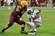 Oct 19, 2013; Tempe, AZ, USA; Arizona State Sun Devils defensive lineman Jaxon Hood (92) sacks Washington Huskies quarterback Keith Price (17) during the second half at Sun Devil Stadium. Mandatory Credit: Matt Kartozian-USA TODAY Sports