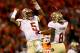 CLEMSON, SC - OCTOBER 19: Jameis Winston #5 of the Florida State Seminoles celebrates after throwing a touchdown with teammate Devonta Freeman #8 of the Florida State Seminoles during their game at Memorial Stadium on October 19, 2013 in Clemson, South C