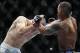 Oct 19, 2013; Houston, TX, USA; Nate Marquardt (red gloves) fights against Hector Lombard (blue gloves) in their welterweight bout during UFC 166 at Toyota Center. Mandatory Credit: Andrew Richardson-USA TODAY Sports