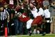 TUSCALOOSA, AL - OCTOBER 19: T.J. Yeldon #4 of the Alabama Crimson Tide fails to pull in this touchdown reception against Braylon Mitchell #34 of the Arkansas Razorbacks at Bryant-Denny Stadium on October 19, 2013 in Tuscaloosa, Alabama. (Photo by Kevin