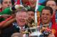 MANCHESTER, ENGLAND - MAY 12: Manchester United Manager Sir Alex Ferguson celebrates with his players and the Premier League trophy following the Barclays Premier League match between Manchester United and Swansea City at Old Trafford on May 12, 2013 in