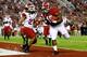 TUSCALOOSA, AL - OCTOBER 19: Jalston Fowler #45 of the Alabama Crimson Tide scores a touchdown past Alan Turner #27 of the Arkansas Razorbacks at Bryant-Denny Stadium on October 19, 2013 in Tuscaloosa, Alabama. (Photo by Kevin C. Cox/Getty Images)