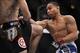 Oct 19, 2013; Houston, TX, USA; John Dodson (red gloves) fights against Darrell Montague (blue gloves) in their flyweight bout during UFC 166 at Toyota Center. Mandatory Credit: Andrew Richardson-USA TODAY Sports