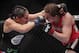 Oct 19, 2013; Houston, TX, USA; Sarah Kaufman (red gloves) fights against Jessica Eye (blue gloves) in their women's bantamweight bout during UFC 166 at Toyota Center. Mandatory Credit: Andrew Richardson-USA TODAY Sports