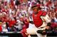 ST LOUIS, MO - OCTOBER 12: Yadier Molina #4 of the St. Louis Cardinals celebrates after the final out against the Los Angeles Dodgers during Game Two of the National League Championship Series at Busch Stadium on October 12, 2013 in St Louis, Missouri. T