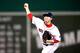 BOSTON, MA - OCTOBER 19: Junichi Tazawa #36 of the Boston Red Sox throws a pitch in the seventh inning against the Detroit Tigers during Game Six of the American League Championship Series at Fenway Park on October 19, 2013 in Boston, Massachusetts. (Ph