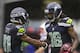 SEATTLE, WA - OCTOBER 14: Sidney Rice #18 celebrates scoring the game-tying touchdown with Golden Tate #81 of the Seattle Seahawks against the New England Patriots at CenturyLink Field on October 14, 2012 in Seattle, Washington. The Seahawks beat the Patr