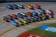 TALLADEGA, AL - OCTOBER 20: Aric Almirola, driver of the #43 Charter Ford, and Jeff Burton, driver of the #31 Caterpillar Chevrolet, lead the field during the NASCAR Sprint Cup Series Camping World RV Sales 500 at Talladega Superspeedway on October 20, 2