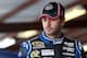 TALLADEGA, AL - OCTOBER 18: Jimmie Johnson, driver of the #48 Lowe's Chevrolet, looks on during practice for the NASCAR Sprint Cup Series 45th Annual Camping World RV Sales 500 at Talladega Superspeedway on October 18, 2013 in Talladega, Alabama. (Photo