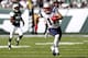 EAST RUTHERFORD, NJ - OCTOBER 20: Julian Edelman #11 of the New England Patriots runs from Isaiah Trufant #35 of the New York Jets during their game at MetLife Stadium on October 20, 2013 in East Rutherford, New Jersey. (Photo by Jeff Zelevansky/Getty