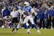 SAN DIEGO, CA-OCTOBER-14: Keenan Allen #13 of the San Diego Chargers is tackled by Greg Toler #28 and Antoine Bethea #41 of the Indianapolis Colts at Qualcomm Stadium October 14, 2013 in San Diego, California. (Photo by Kevork Djansezian/Getty Images)