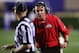Oct 5, 2013; Evanston, IL, USA; Ohio State Buckeyes head coach Urban Meyer (right) yells at an official during the fourth quarter against the Northwestern Wildcats at Ryan Field. Ohio State won 40-30. Mandatory Credit: Jerry Lai-USA TODAY Sports