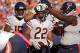 LANDOVER, MD - OCTOBER 20: Running back Matt Forte #22 of the Chicago Bears celebrates after scoring a touchdown in the fourth quarter against the Washington Redskins at FedExField on October 20, 2013 in Landover, Maryland. The Washington Redskins won, 45
