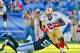 Oct 20, 2013; Nashville, TN, USA; San Francisco 49ers running back Frank Gore (21) rushes against Tennessee Titans outside linebacker Akeem Ayers (56) during the first half at LP Field. Mandatory Credit: Jim Brown-USA TODAY Sports