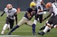 GREEN BAY, WI - OCTOBER 20: Micah Hyde #33 of the Green Bay Packers brings the ball back to midfield on a kick return in the first quarter of the game against the Cleveland Browns at Lambeau Field on October 20, 2013 in Green Bay, Wisconsin. (Photo by Mik