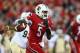 LOUISVILLE, KY - OCTOBER 18: Teddy Bridgewater #5 of the Louisville Cardinals runs with the ball during the game against the Central Florida Knights at Papa John's Cardinal Stadium on October 18, 2013 in Louisville, Kentucky. (Photo by Andy Lyons/Getty