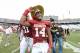 Oct 13, 2012; Dallas, TX, USA; Oklahoma Sooner cornerback Aaron Colvin (14) celebrates with the golden hat trophy after the game against the Texas Longhorns during the red river rivalry at the Cotton Bowl. The Sooners beat the Longhorns 63-21. Mandatory C