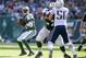 EAST RUTHERFORD, NJ - OCTOBER 20: Quarterback Geno Smith #7 of the New York Jets drops back to pass during the 3rd quarter of the New York Jets 30-27 win over the New England Patriots at MetLife Stadium on October 20, 2013 in East Rutherford, New Jersey.