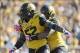 Oct 19, 2013; Columbia, MO, USA; Missouri Tigers defensive lineman Michael Sam (52) is congratulated by defensive lineman Lucas Vincent (96) after sacking Florida Gators quarterback Tyler Murphy (3) (not pictured) during the second half at Faurot Field. M