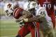 Oct 18, 2013; Louisville, KY, USA; UCF Knights running back William Stanback (28) tackles Louisville Cardinals running back Senorise Perry (32) during the second half of play at Papa John's Cardinal Stadium. Central Florida defeated Louisville 38-35. Man