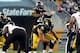 Oct 20, 2013; Pittsburgh, PA, USA; Pittsburgh Steelers running back Le'Veon Bell (26) takes a direct snap against the Baltimore Ravens during the second half at Heinz Field. The Steelers won the game, 19-16. Mandatory Credit: Jason Bridge-USA TODAY Sports