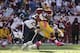 Oct 20, 2013; Landover, MD, USA; Washington Redskins running back Alfred Morris (46) carries the ball as Chicago Bears free safety Chris Conte (47) and Bears strong safety Major Wright (21) make the tackle in the third quarter at FedEx Field. The Redskins