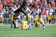 LUBBOCK, TX - OCTOBER 12:Kenny Williams #34 of the Texas Tech Red Raiders gets upended by Deon Broomfield #26 of the Iowa State Cyclones during game action on October 12, 2013 at AT&T Jones Stadium in Lubbock, Texas. Texas Tech won the game over Iowa Sta