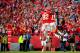 KANSAS CITY, MO - OCTOBER 20: Wide receiver Dwayne Bowe #82 of the Kansas City Chiefs congratulates quarterback Alex Smith #11 after Smith carried the ball into the endzone for a touchdown during the 1st half of the game against the Houston Texans at Arr