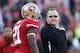 Jan 12, 2013; San Francisco, CA, USA; San Francisco 49ers offensive coordinator Greg Roman (right) talks to running back Frank Gore (21) before the NFC divisional round playoff game against the Green Bay Packers at Candlestick Park. Mandatory Credit: Car