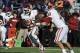 Oct 19, 2013; Lawrence, KS, USA; Oklahoma Sooners quarterback Blake Bell (10) hands off to running back Roy Finch (22) against the Kansas Jayhawks in the second half at Memorial Stadium. Oklahoma won the game 34-19. Mandatory Credit: John Rieger-USA TODAY