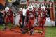 Oct 18, 2013; Louisville, KY, USA; Louisville Cardinals running back Michael Dyer (26) leads the team out to the field before the first quarter of play against the UCF Knights at Papa John's Cardinal Stadium. Mandatory Credit: Jamie Rhodes-USA TODAY Sport