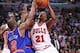 Apr 11, 2013; Chicago, IL, USA; Chicago Bulls small forward Jimmy Butler (21) is defended by New York Knicks point guard Raymond Felton (2) during the second half at the United Center. Chicago won 118-111. Mandatory Credit: Dennis Wierzbicki-USA TODAY Spo