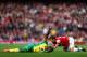 LONDON, ENGLAND - OCTOBER 19: Alexander Tettey of Norwich City calls for help after a challenge with Mathieu Flamini of Arsenal during the Barclays Premier League match between Arsenal and Norwich City at the Emirates Stadium on October 19, 2013 in Londo