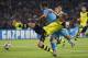 NAPLES, ITALY - SEPTEMBER 18: Sven Bender (R) of Borussia Dortmund competes for the ball with Cristian Maggio of SSC Napoli during the Uefa Champions League Group F match between Napoli and Borussia Dortmund at Stadio San Paolo on September 18, 2013 in N