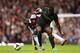 LONDON, ENGLAND - OCTOBER 19: Mohamed Diame of West Ham and Micah Richards of Manchester City battle for the ball during the Barclays Premier League match between West Ham United and Manchester City at Boleyn Ground on October 19, 2013 in London, Englan