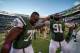 EAST RUTHERFORD, NJ - OCTOBER 20: Defensive tackle Leger Douzable #78 and defensive end Sheldon Richardson #91 of the New York Jets celebrate at the end of the New York Jets 30-27 win over the New England Patriots at MetLife Stadium on October 20, 2013 in