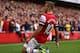 LONDON, ENGLAND - OCTOBER 19: Jack Wilshere of Arsenal celebrates as he scores their first goal during the Barclays Premier League match between Arsenal and Norwich City at the Emirates Stadium on October 19, 2013 in London, England. (Photo by Paul Gilh