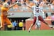 South Carolina QB Connor Shaw (right) and Tennessee DL Daniel Hood