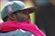 Oct 13, 2013; Tampa, FL, USA; Philadelphia Eagles quarterback Michael Vick (7) looks on from the bench as he wears pink in honor of breast cancer awareness during the second half at Raymond James Stadium. Philadelphia Eagles defeated the Tampa Bay Buccane