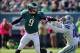October 20, 2013; Philadelphia, PA, USA; Philadelphia Eagles quarterback Nick Foles (9) runs away from Dallas Cowboys outside linebacker Justin Durant (52) during first quarter action at Lincoln Financial Field. Mandatory Credit: Jeffrey Pittenger-USA TOD