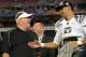 Jan 3, 2013; Glendale, AZ, USA; Oregon Ducks coach Chip Kelly (left) and quarterback Marcus Mariota (8) celebrate after the 2013 Fiesta Bowl against the Kansas State Wildcats at University of Phoenix Stadium. Oregon defeated Kansas 35-17. Mandatory Credit