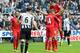 NEWCASTLE UPON TYNE, UNITED KINGDOM - OCTOBER 19: Steven Gerrard of Liverpool celebrates with Jordan Henderson (L) and Luis Suarez (up) after scoring his 100th goal for the club from the penalty spot during the Barclays Premier League game between Newcast