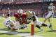 PALO ALTO, CA - OCTOBER 19: Tyler Gaffney #25 of the Stanford Cardinal is hit by Myles Jack #30 of the UCLA Bruins as he dives for the endzone at Stanford Stadium on October 19, 2013 in Palo Alto, California. The ball was marked on the 1-yard line and t