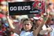TAMPA, FL - SEPTEMBER 29: A fan of the Tampa Bay Buccaneers watches play against the Arizona Cardinals September 29, 2013 at Raymond James Stadium in Tampa, Florida. The Cardinals won 13 - 10. (Photo by Al Messerschmidt/Getty Images)