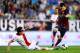 MADRID, SPAIN - SEPTEMBER 21: Lionel Messi of FC Barcelona duels for the ball with Saul Niguez of Rayo Vallecano during the La Liga match between Rayo Vallecano de Madrid and FC Barcelona at Estadio Teresa Rivero on September 21, 2013 in Madrid, Spain.