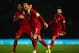 BELFAST, NORTHERN IRELAND - SEPTEMBER 06: Cristiano Ronaldo of Portugal celebrates scoring with team mate Joao Periera during the FIFA 2014 World Cup Qualifying Group F match between Northern Ireland and Portugal at Windsor Park on September 6, 2013 in B