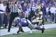 Oct 12, 2013; Manhattan, KS, USA; Kansas State Wildcats quarterback Daniel Sams (4) is pushed out of bounds by Baylor Bears cornerback K.J. Morton (8) during the game at Bill Snyder Family Stadium. The Wildcats lost 35-25.Mandatory Credit: Scott Sewell-US