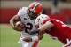 Oct 5, 2013; Lincoln, NE, USA; Nebraska Cornhuskers defender Jared Afalava (33) tackles Illinois Fighting Illini quarterback Nathan Scheelaase (2) during the second quarter at Memorial Stadium. Mandatory Credit: Bruce Thorson-USA TODAY Sports