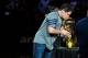 Dec 25, 2011; Dallas, TX, USA; Dallas Mavericks owner Mark Cuban kisses the NBA trophy before the NBA championship banner is raised before the game against the Miami Heat at the American Airlines Center. Mandatory Credit: Jerome Miron-USA TODAY Sports